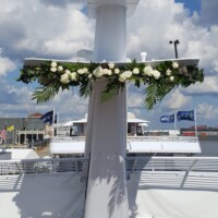 Garland with flowers and tropical greenery