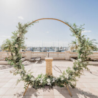 Draped Greenery & Flower Circle Arch