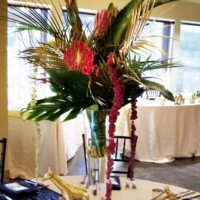 Tall Tropical flowers & greenery centerpiece Tall Tropical flowers & greenery centerpiece
