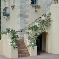 Greenery draped staircase