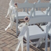 Flower with long ribbon ties